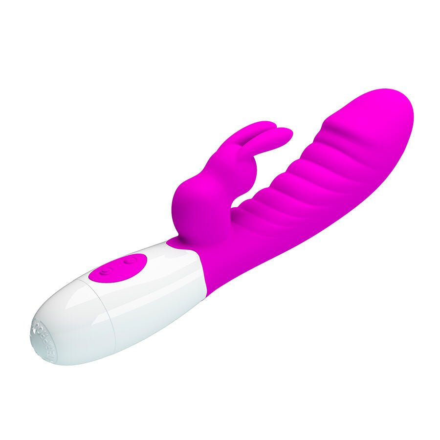 Vibromasseur Naughty Bunny fuchsia de Pretty Love vu de trois quarts, nervures